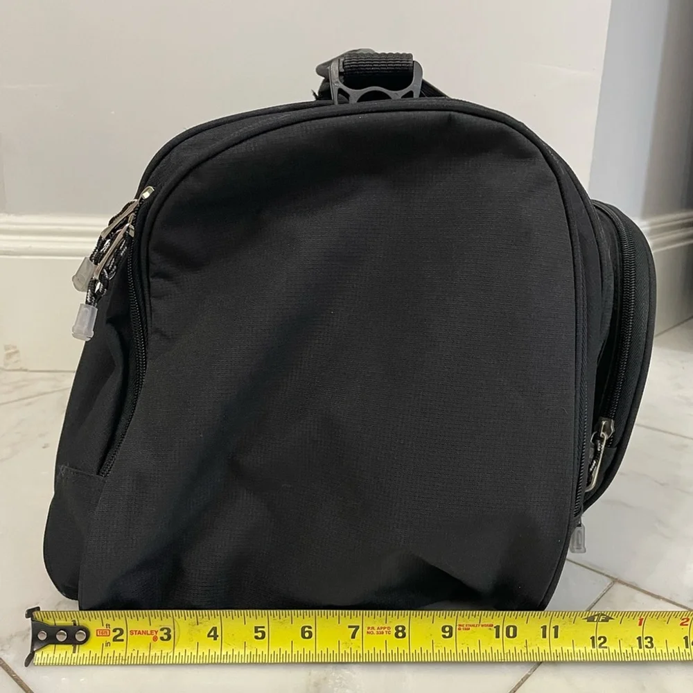 Calpak black canvas multi-pocket dual strap duffel bag travel luggage gym